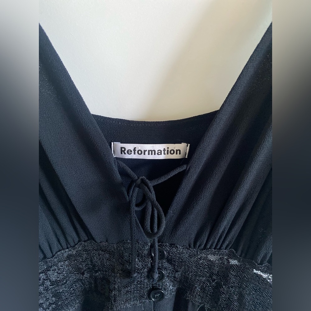 Size 6, never worn, Reformation Dress, no damage, all buttons functional